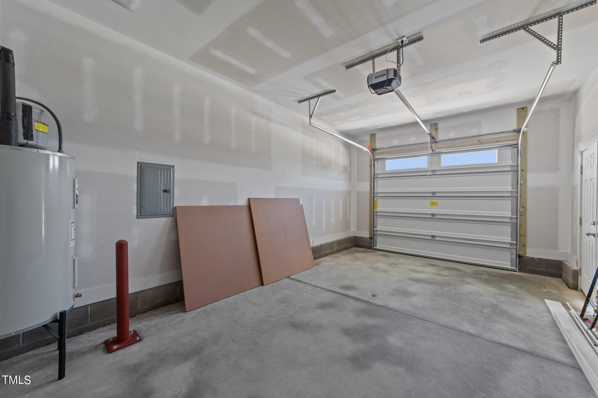282 Fields Road Pikeville, NC 27863 - Photo 21 of 40 a view of storage and utility room with refrigerator