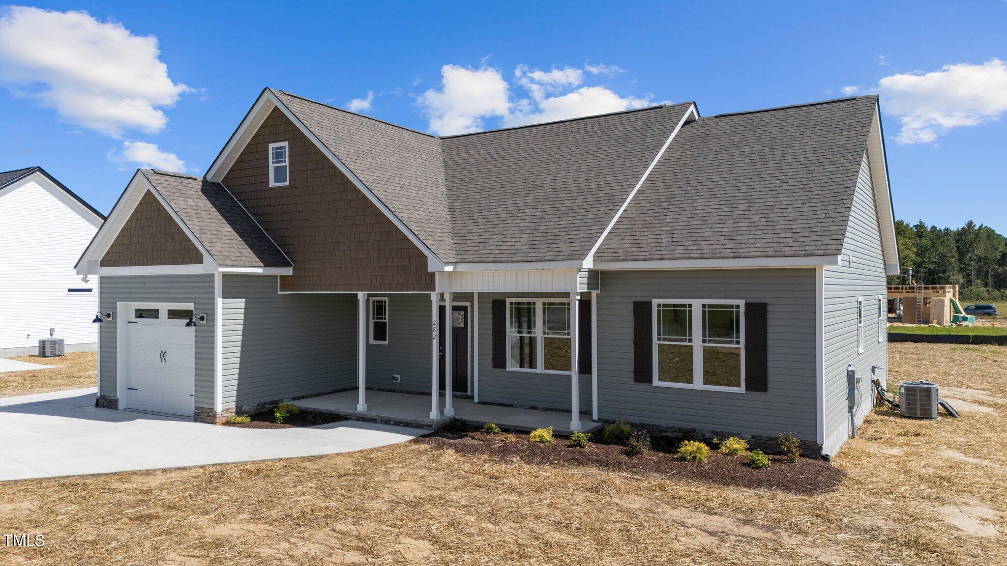 282 Fields Road Pikeville, NC 27863 - Photo 3 of 40 a front view of a house