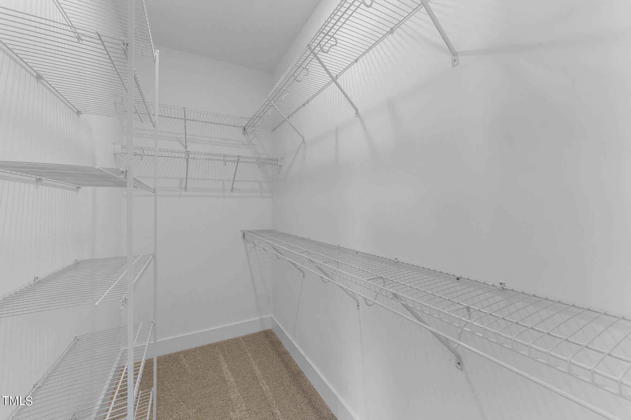 282 Fields Road Pikeville, NC 27863 - Photo 31 of 40 a view of a room with racks on the wall