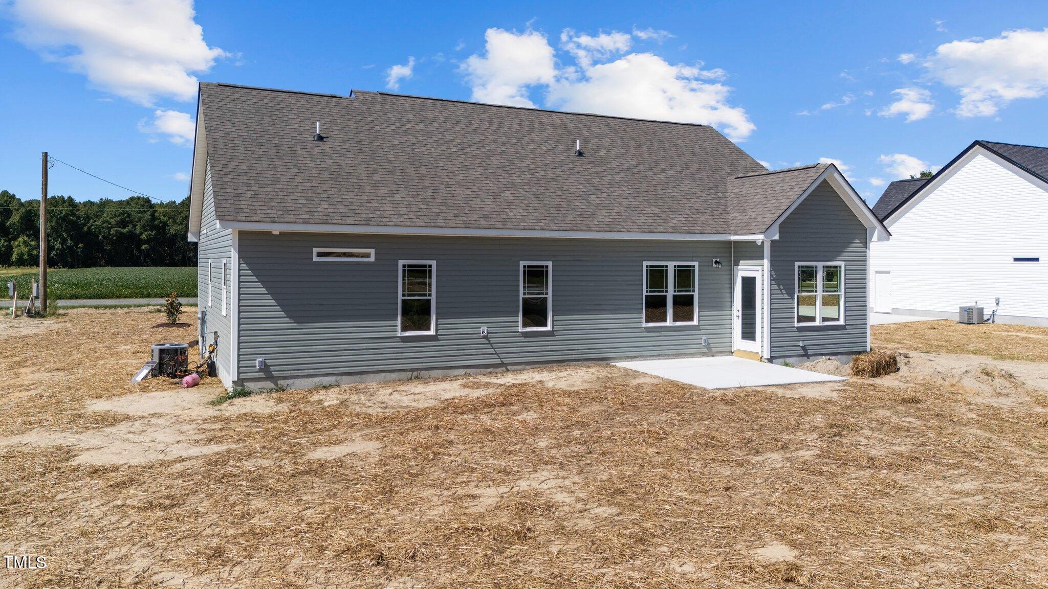 282 Fields Road Pikeville, NC 27863 - Photo 35 of 40 a house view with a outdoor space
