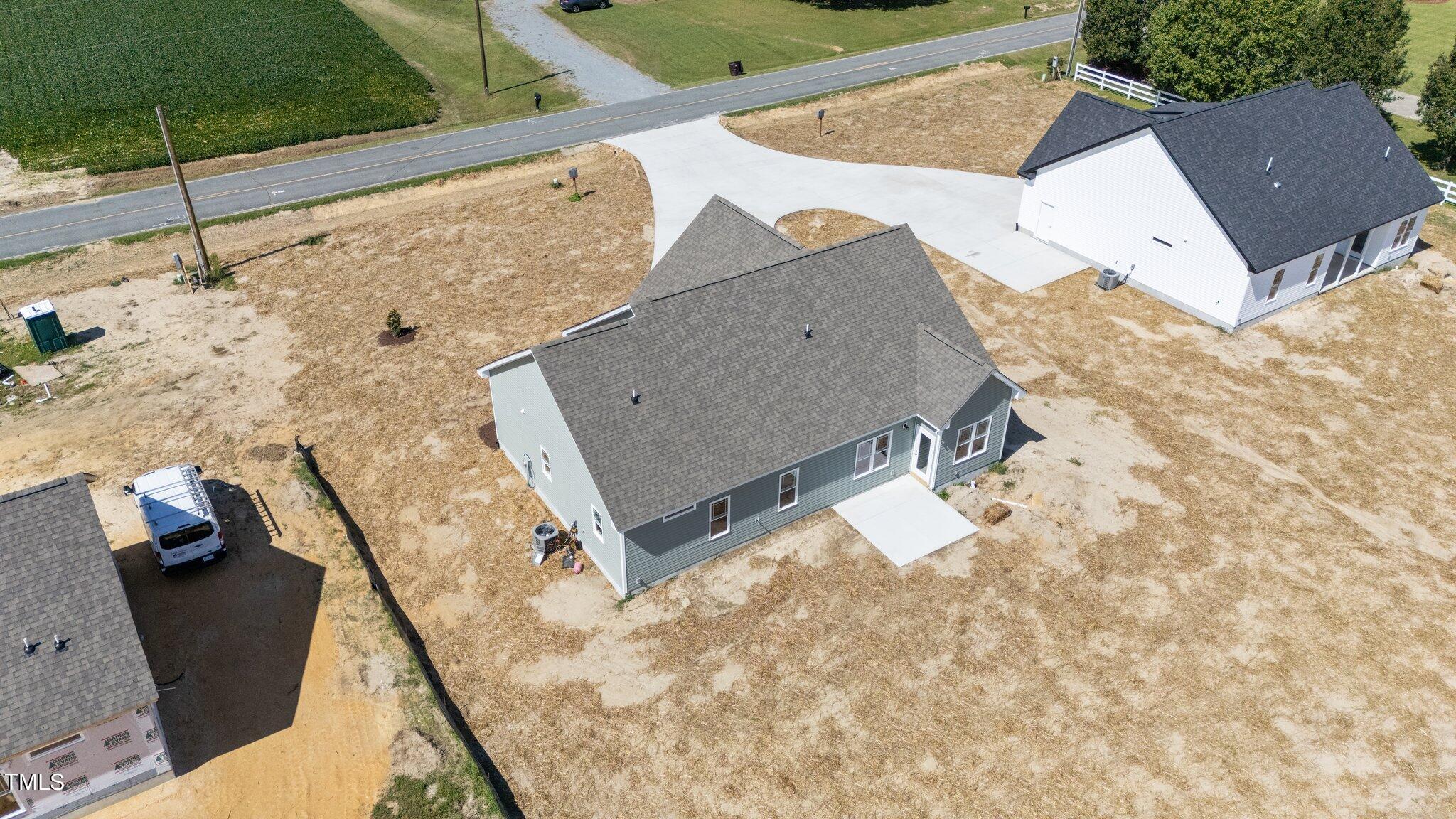 282 Fields Road Pikeville, NC 27863 - Photo 37 of 40 swimming pool view with a flat screen tv
