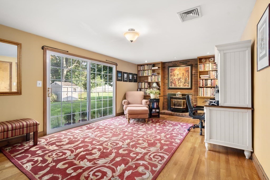 14 Independence Drive Brookline, MA 02467 - Photo 12 of 35 a bedroom with a bed and wooden floor