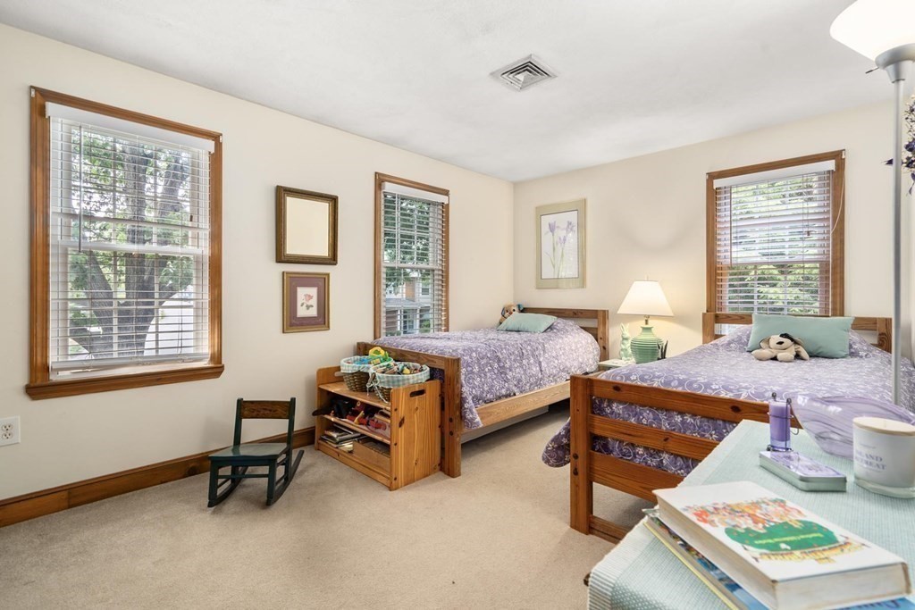 14 Independence Drive Brookline, MA 02467 - Photo 15 of 35 a bedroom with a bed and a window