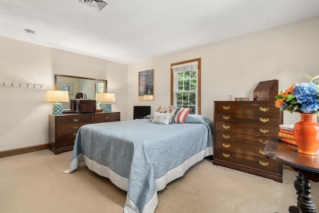 14 Independence Drive Brookline, MA 02467 - Photo 18 of 35 a living room with a bed and furniture