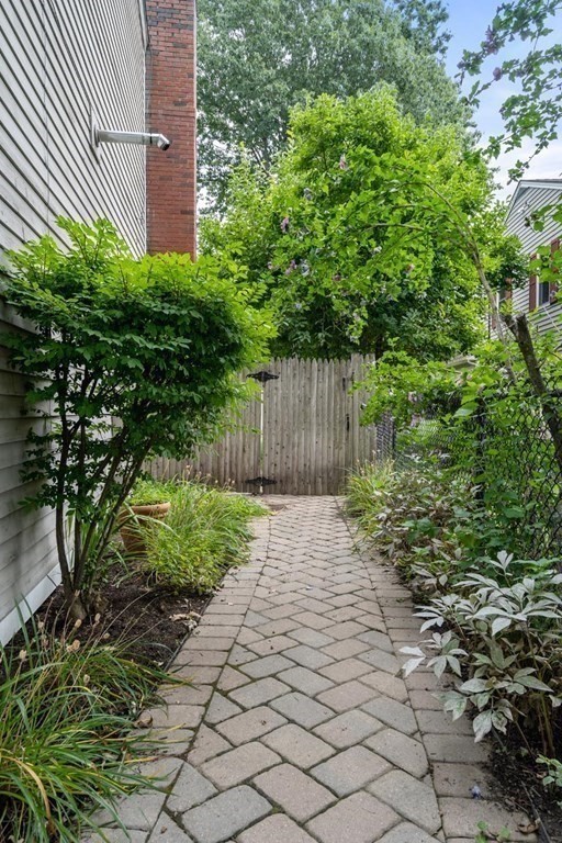 14 Independence Drive Brookline, MA 02467 - Photo 27 of 35 a backyard of a house with lots of green space