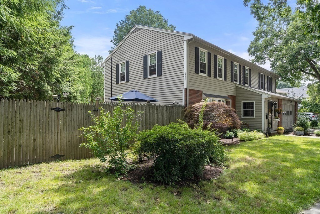 14 Independence Drive Brookline, MA 02467 - Photo 35 of 35 a front view of a house with a yard