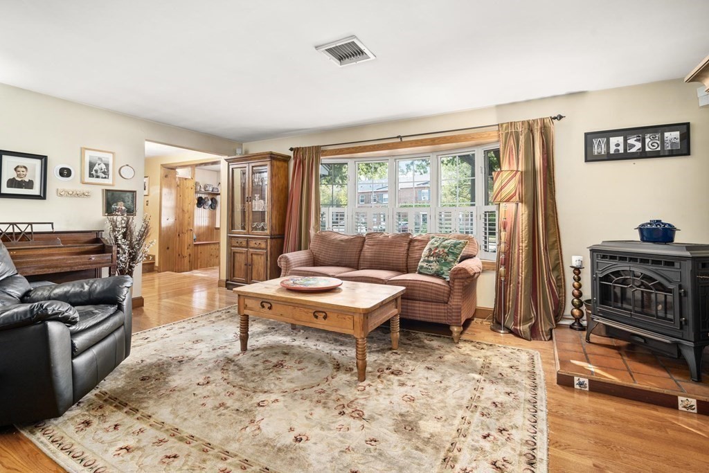 14 Independence Drive Brookline, MA 02467 - Photo 5 of 35 a living room with furniture and a flat screen tv