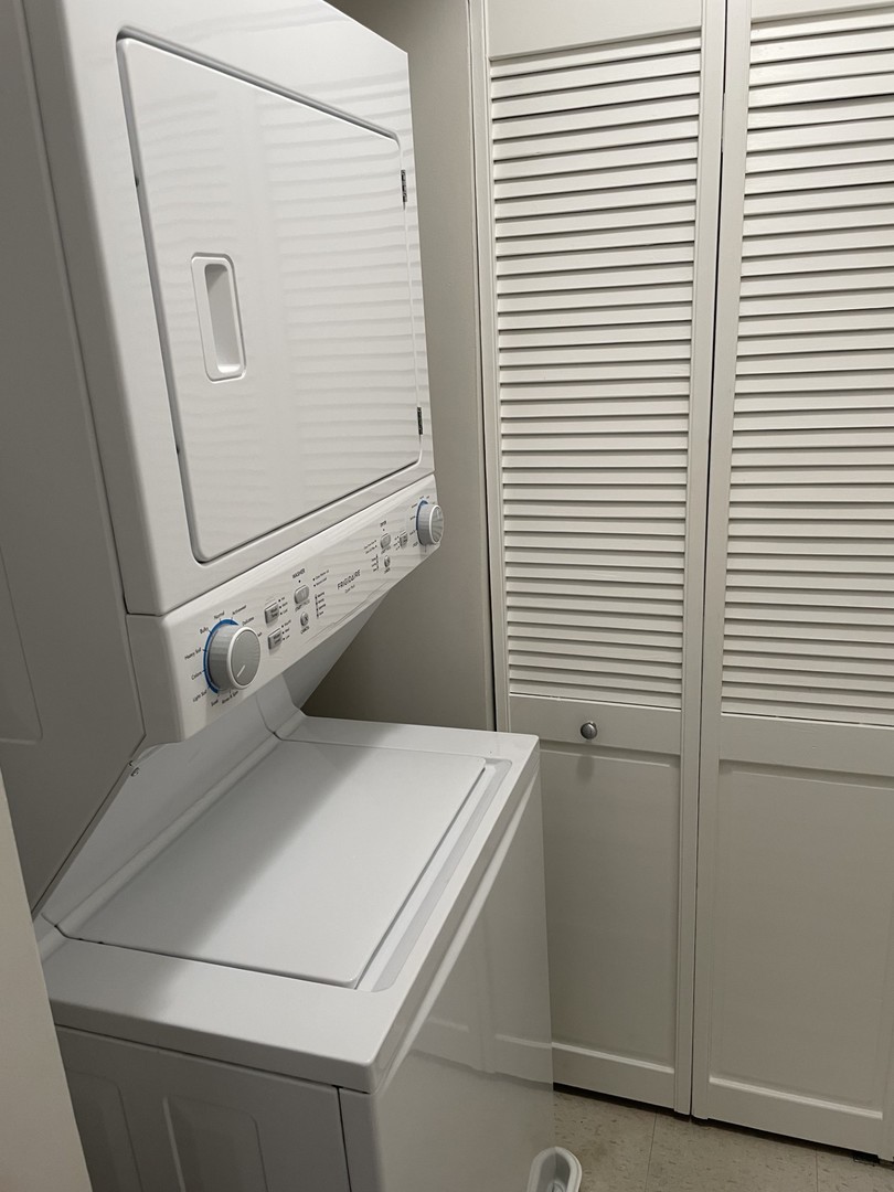 7318 North Honore Street, Unit 403 Chicago, IL 60626 - Photo 12 of 15 a close up view of a washer and dryer