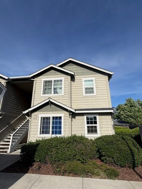 668 Midway Road Medford, OR 97501 - Photo 2 of 4 a front view of a house with a yard