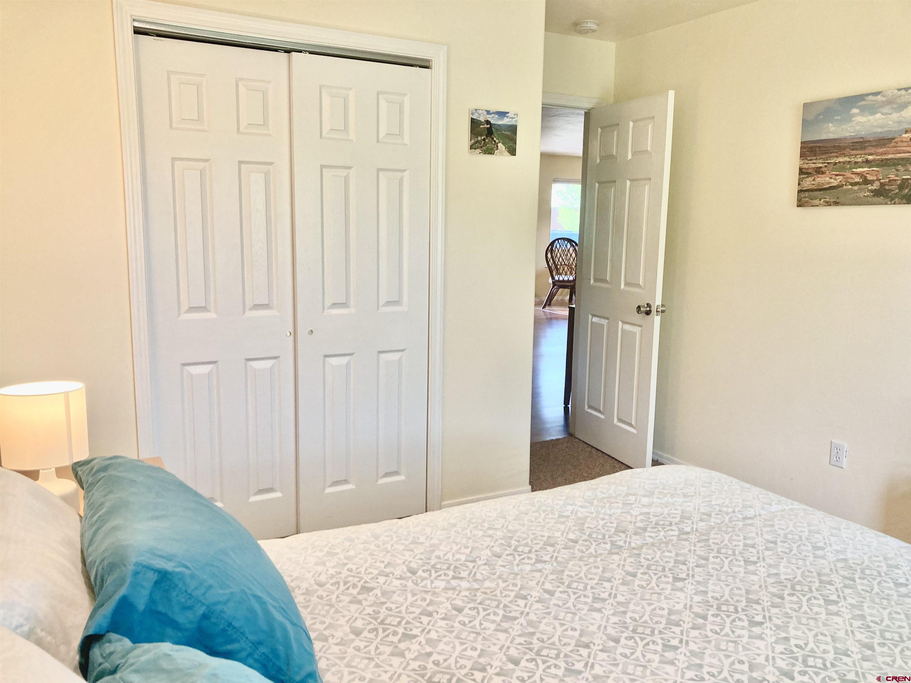 56 Bad Mule Road Durango, CO 81301 - Photo 23 of 35 a bedroom with a bed and a couch