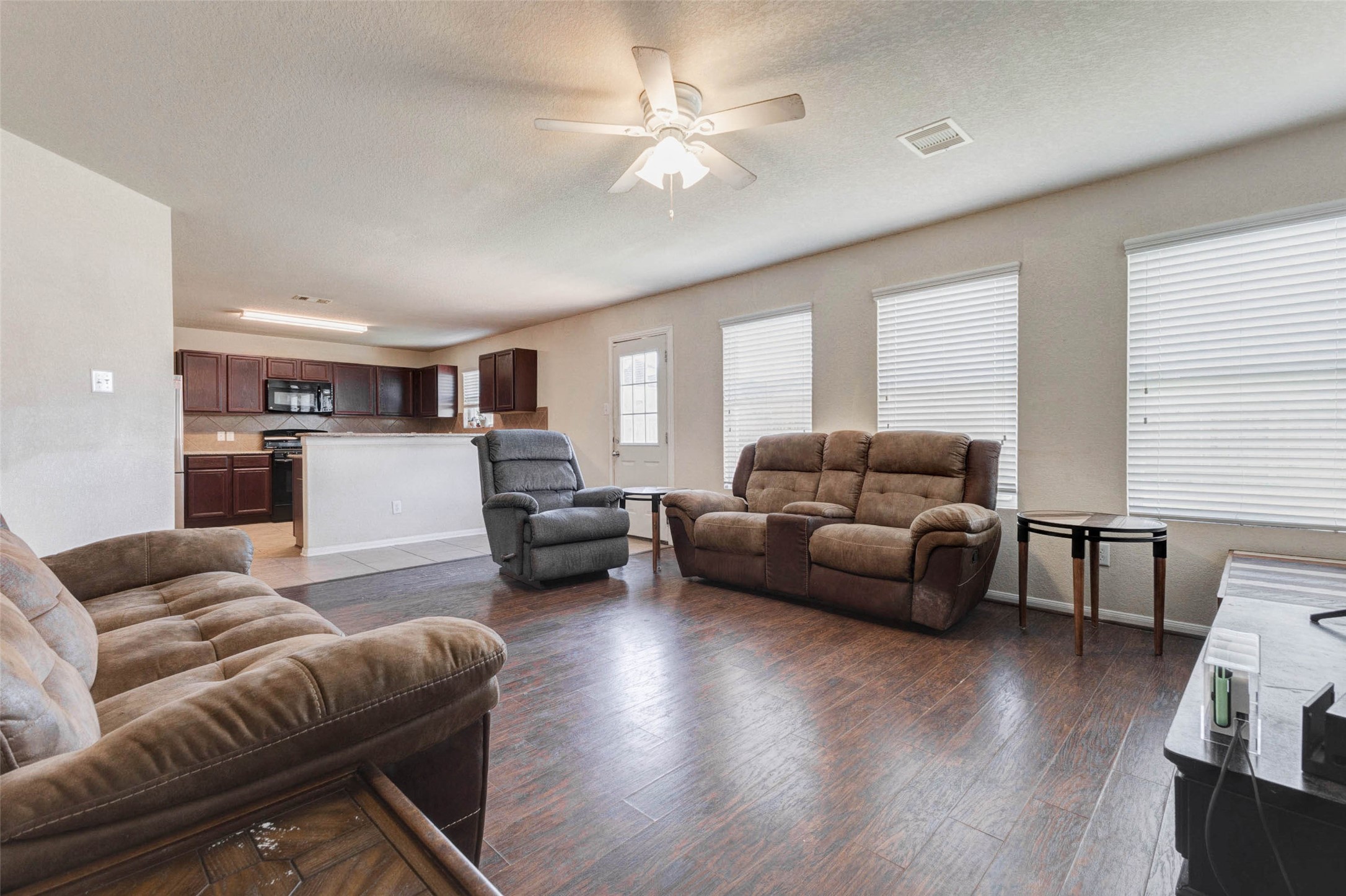 3027 Upland Spring Trace Katy, TX 77493 - Photo 11 of 29 a living room with furniture and a wooden floor