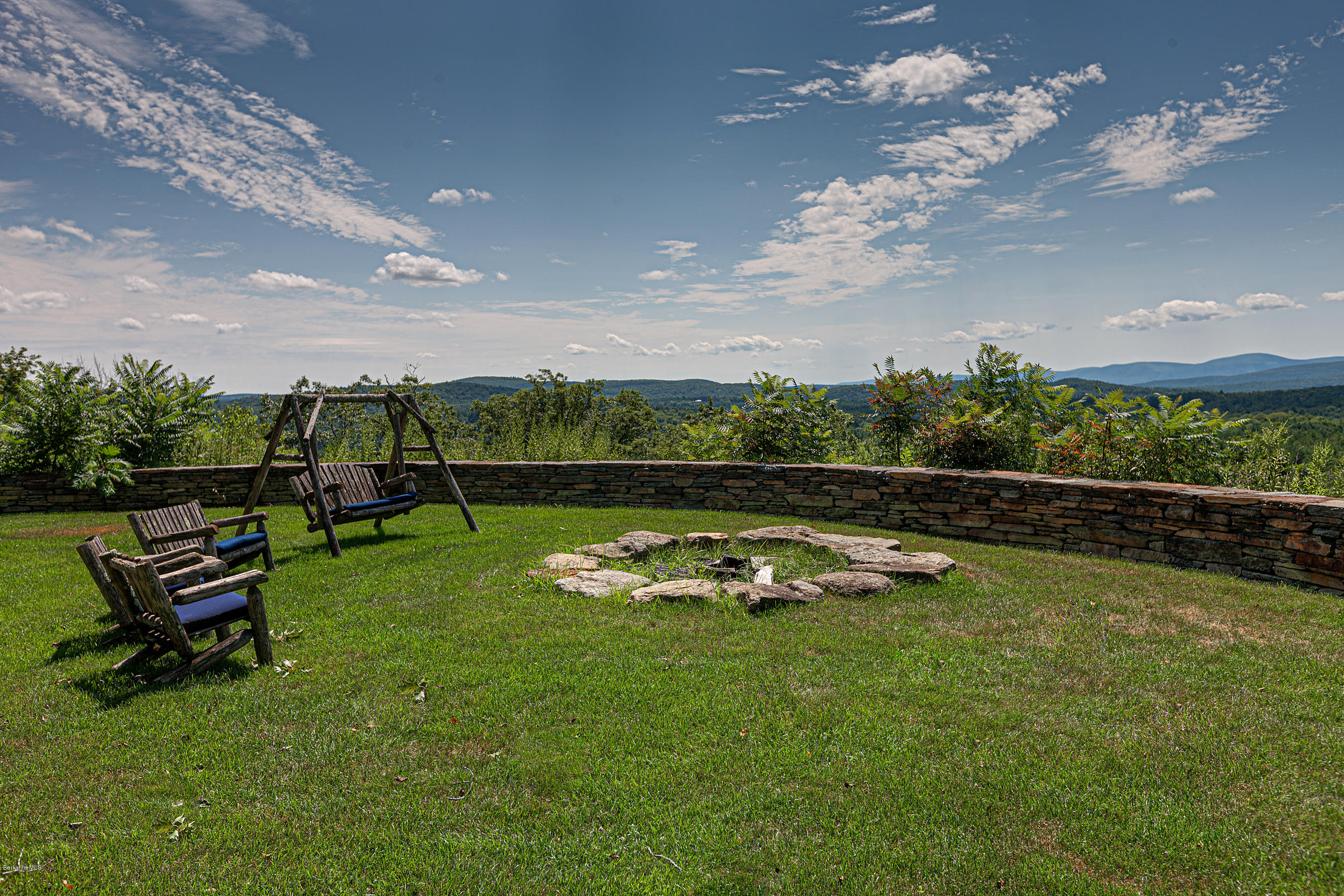 179 Mt Hunger Road Monterey, MA 01245 - Photo 38 of 66 STONE WALLS SURROUND THE FIRE PIT