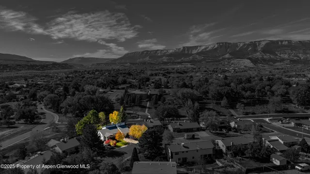 a view of a mountain from a balcony