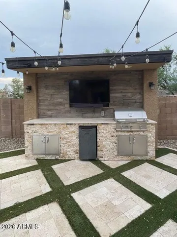 a view of an chairs and tables in the patio