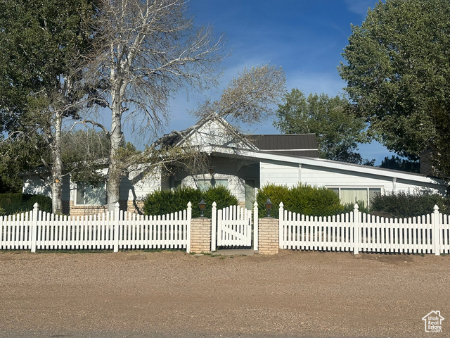 290 North 200th Street East Holden, UT 84636 - Photo 1 of 1 View of front of house with a fenced front yard