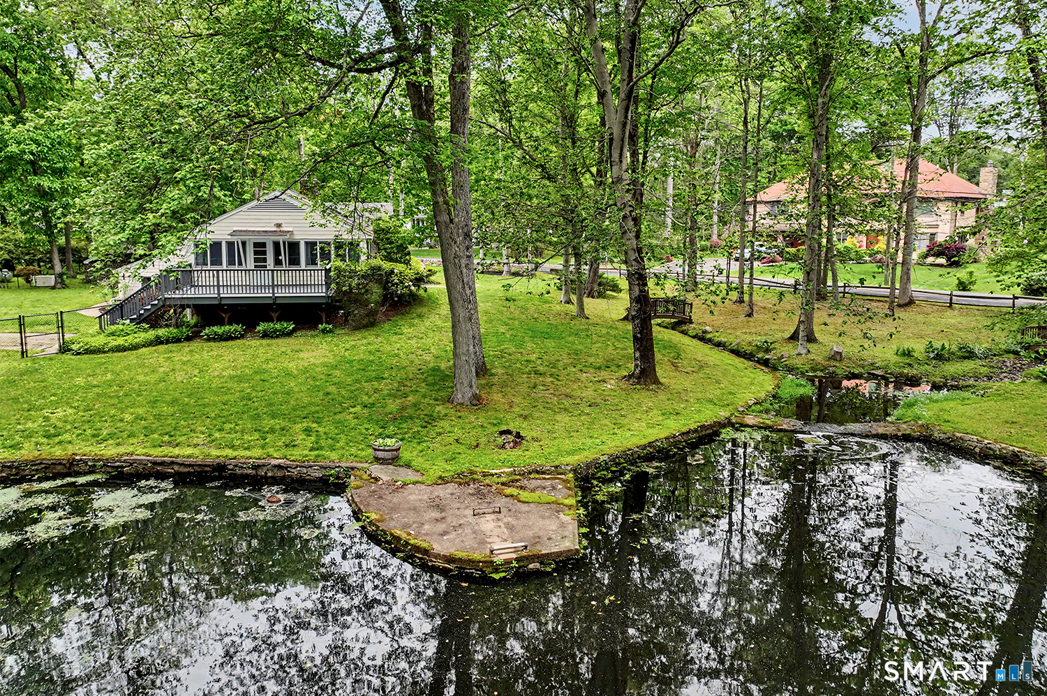 19 Geneva Road Norwalk, CT 06850 - Photo 29 of 33 a house view with a garden space