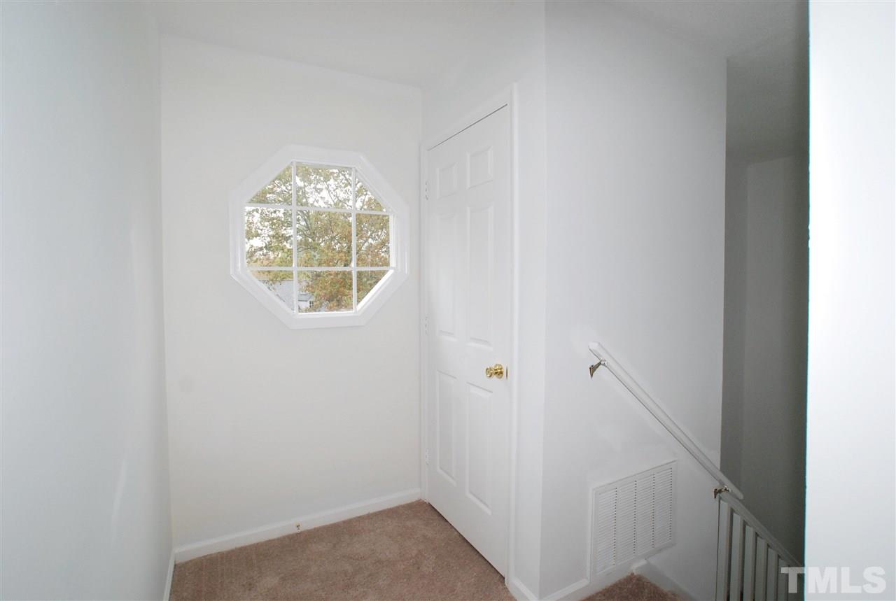 3617 Wickersham Way Raleigh, NC 27604 - Photo 14 of 25 a view of an entryway with wooden floor