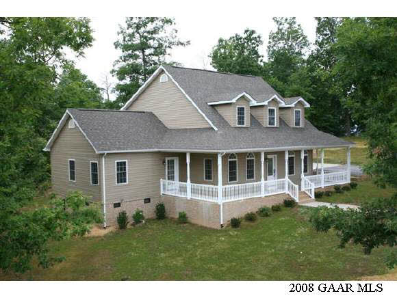 771 Rife's Ford Road Verona, VA 24482 - Photo 1 of 12 a house with trees in the background