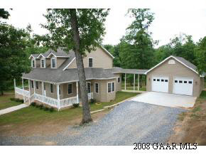 771 Rife's Ford Road Verona, VA 24482 - Photo 12 of 12 a front view of a house with a yard and garage