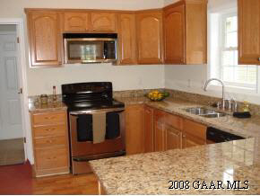 771 Rife's Ford Road Verona, VA 24482 - Photo 7 of 12 a kitchen with a sink stove and microwave