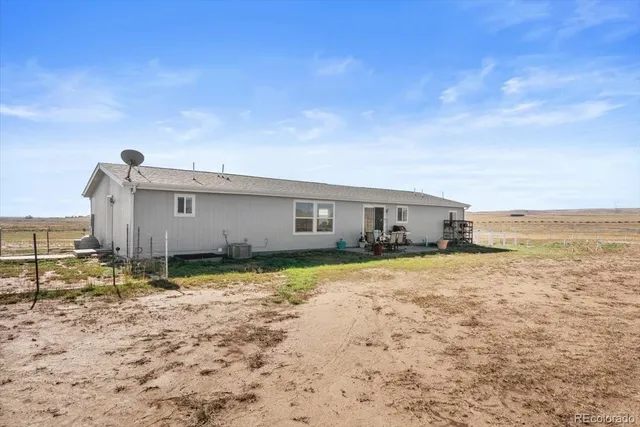 $621,500 | 54435 County Road 21, Carr, CO 80612