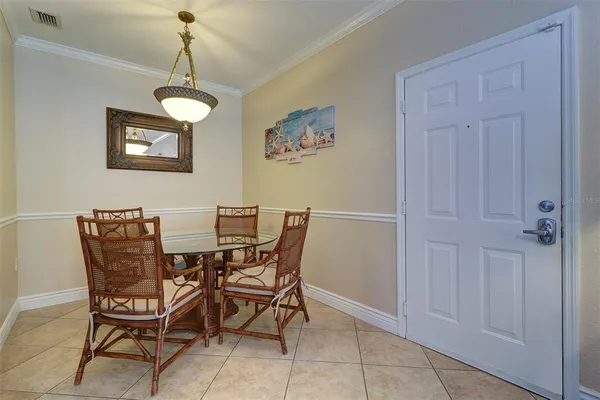 a view of a dining room with furniture