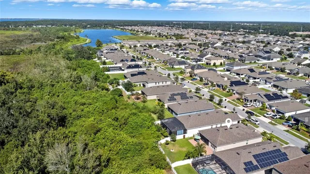 an aerial view of a house with a garden