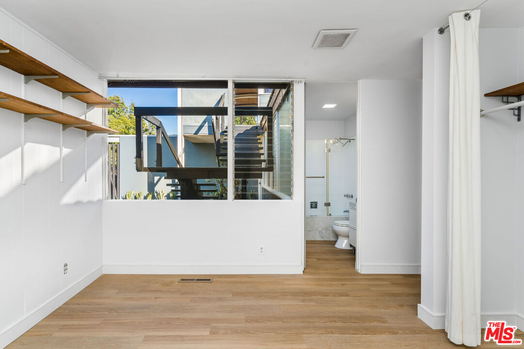 11271 Chalon Road Los Angeles, CA 90049 - Photo 23 of 35 a view of an empty room