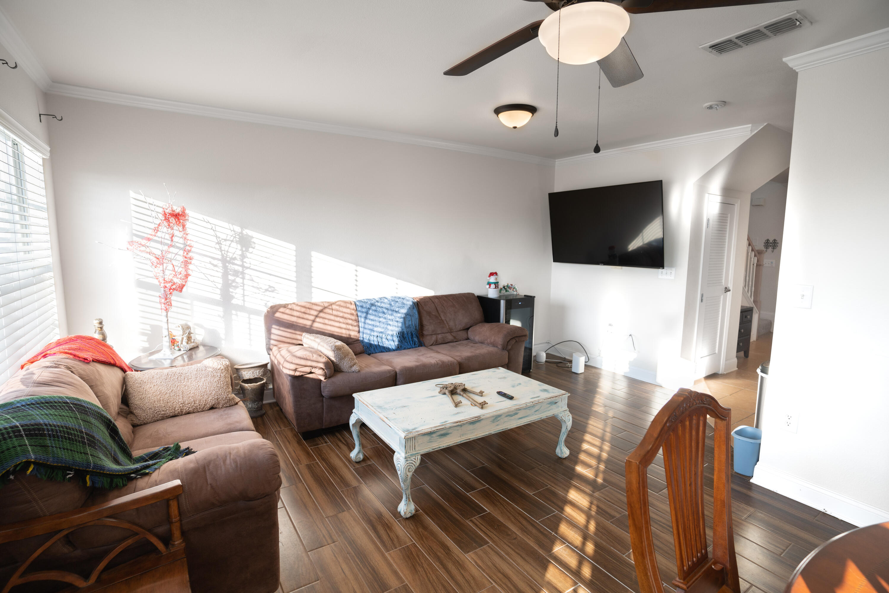 583 Wingspan Way Crestview, FL 32536 - Photo 5 of 11 a living room with furniture a flat screen tv and a window