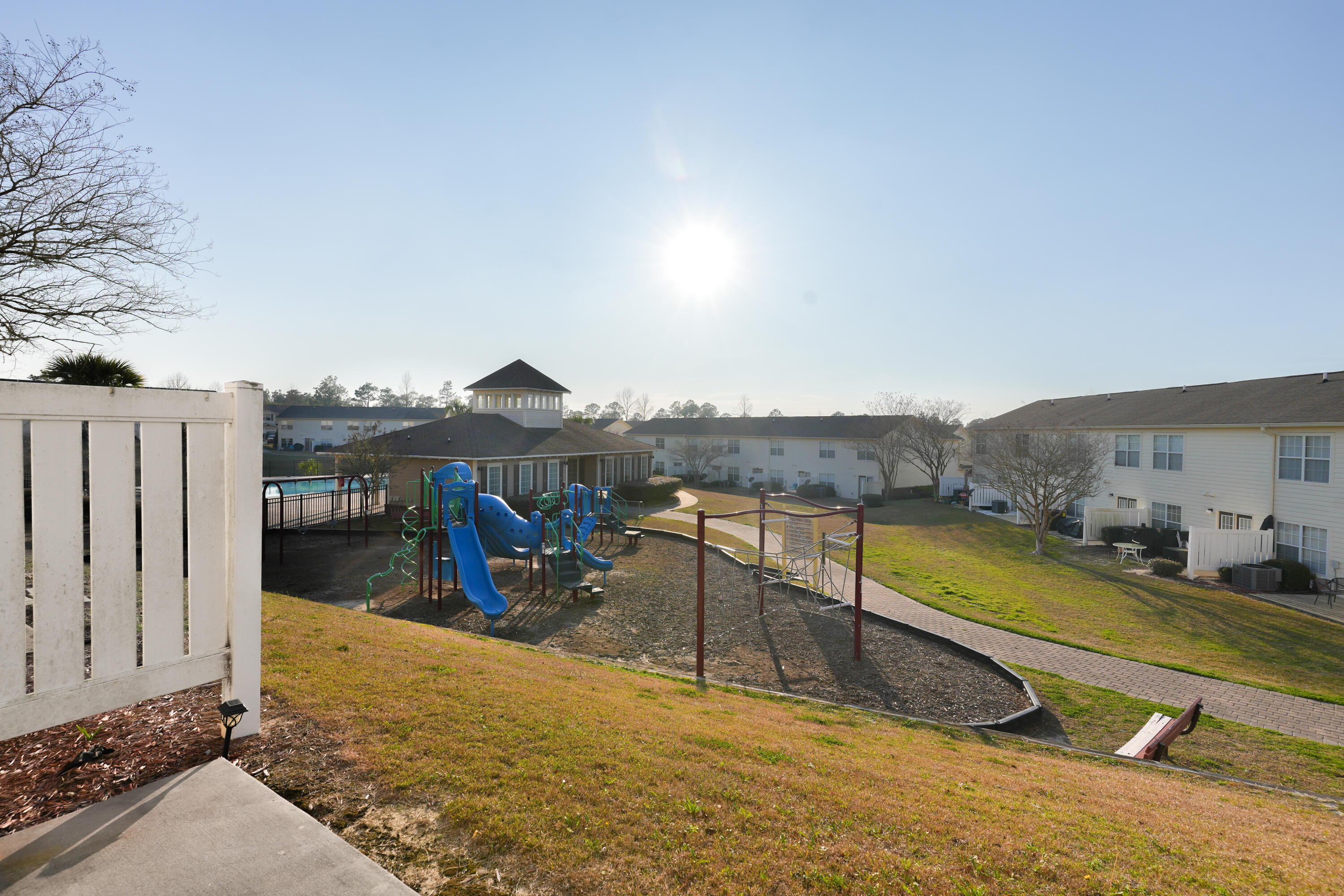 583 Wingspan Way Crestview, FL 32536 - Photo 9 of 11 a view of a swimming pool with a lounge chair