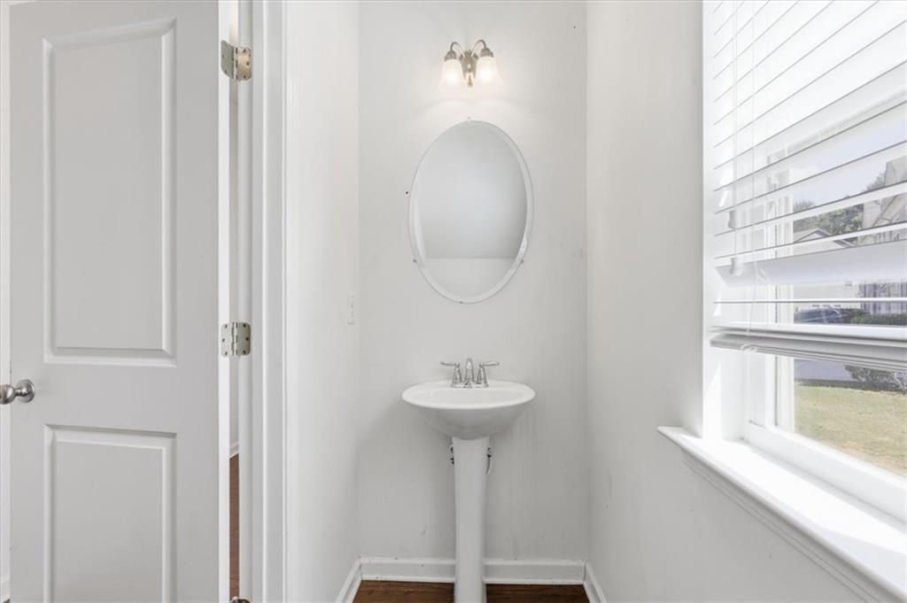 5064 Longview Walk Decatur, GA 30035 - Photo 9 of 30 a bathroom with a sink and a mirror