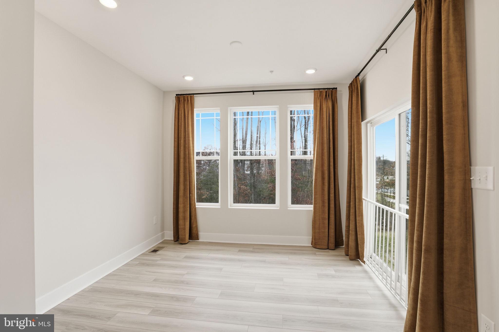 1810 Betterton Road Essex, MD 21221 - Photo 11 of 34 a view of an empty room with a window