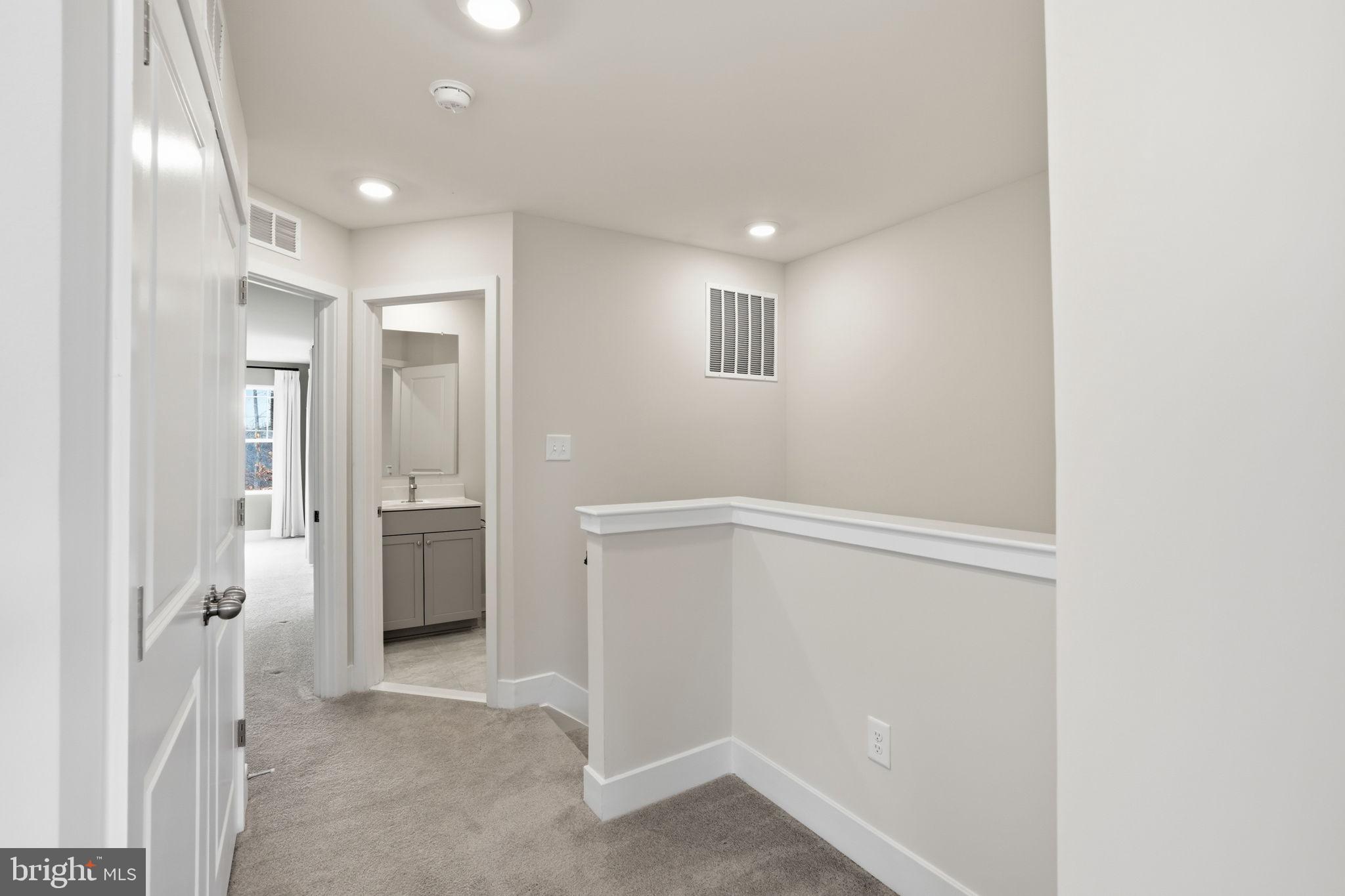 1810 Betterton Road Essex, MD 21221 - Photo 24 of 34 a view of a hallway with closet and bathroom