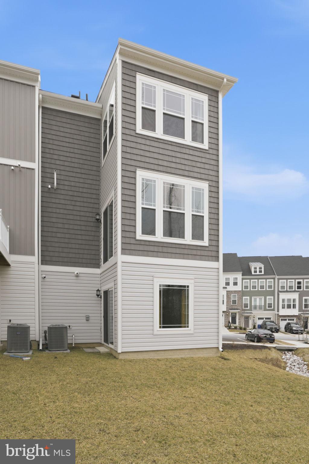 1810 Betterton Road Essex, MD 21221 - Photo 33 of 34 a front view of a building with swimming pool