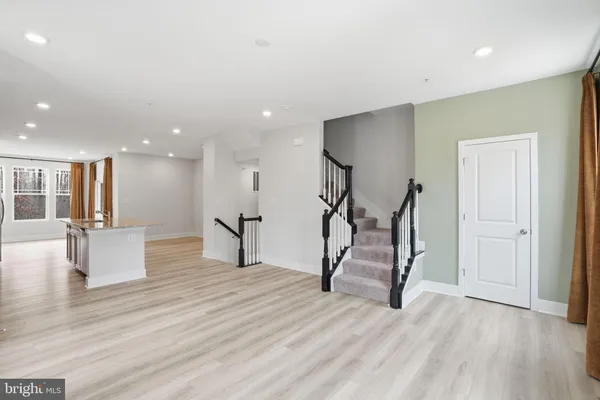 a view of a livingroom with wooden floor