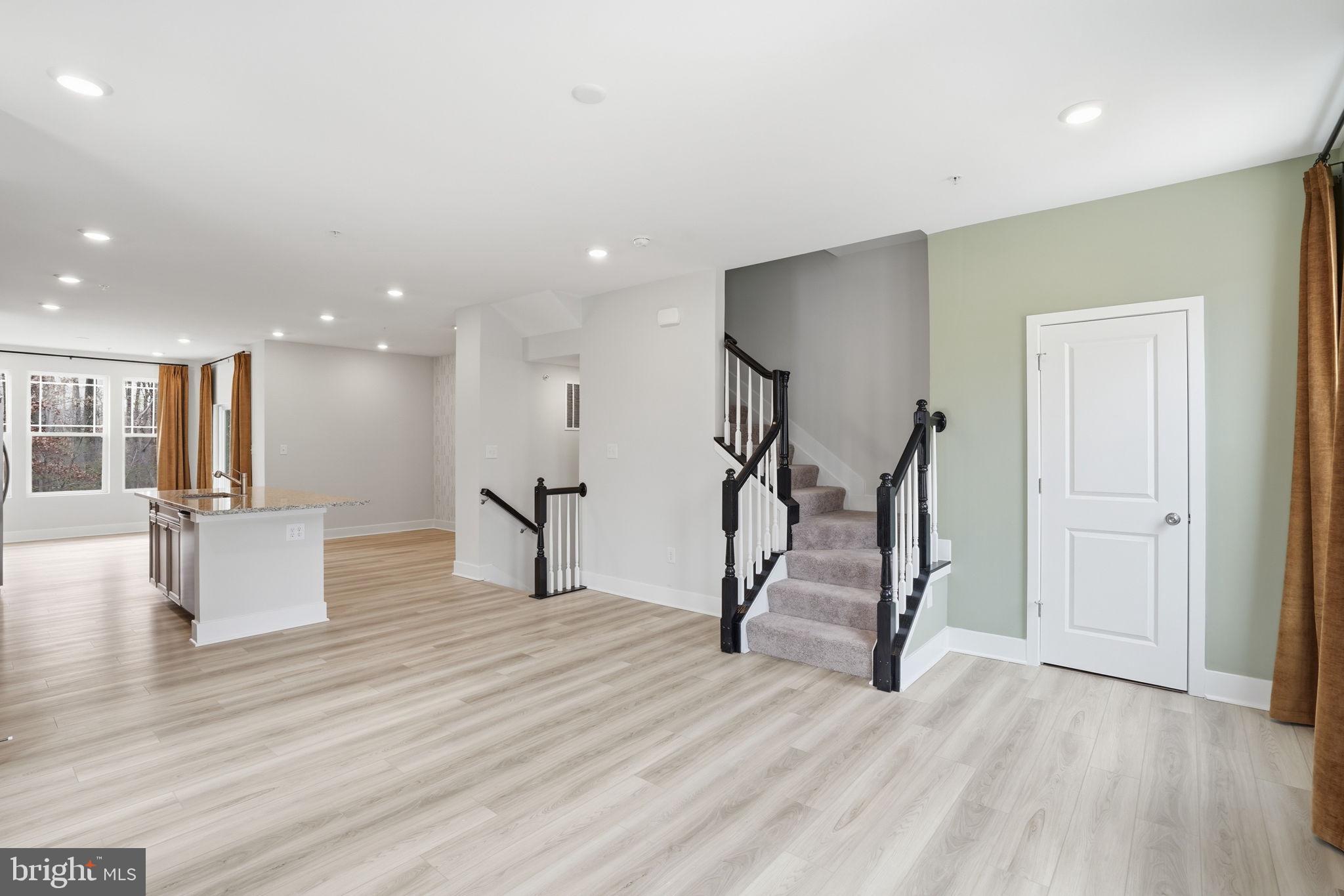 1810 Betterton Road Essex, MD 21221 - Photo 8 of 34 a view of a livingroom with wooden floor