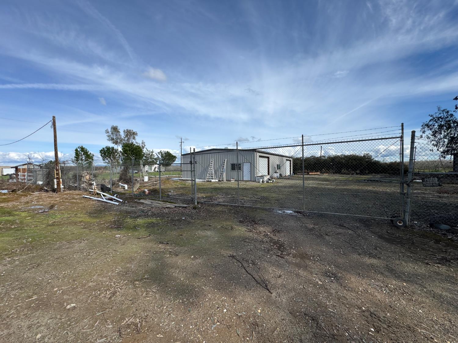 6722 Bryden Road Marysville, CA 95901 - Photo 32 of 33 a view of a yard with wooden fence