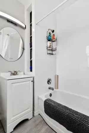 a bedroom with furniture and a bed