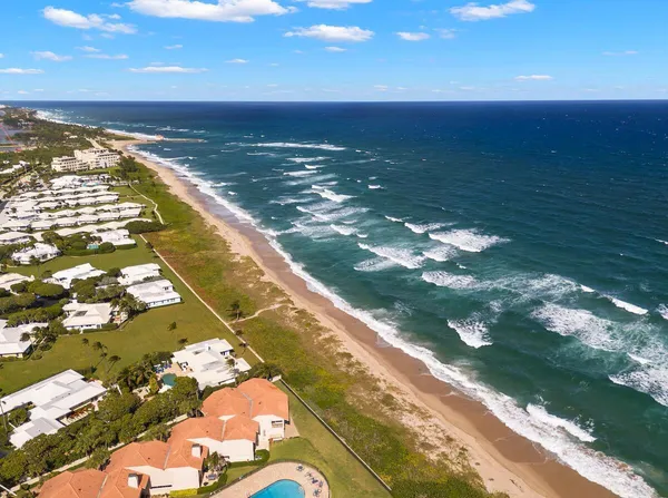 a view of ocean from a bathroom