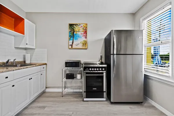 a bathroom with a toilet and a sink