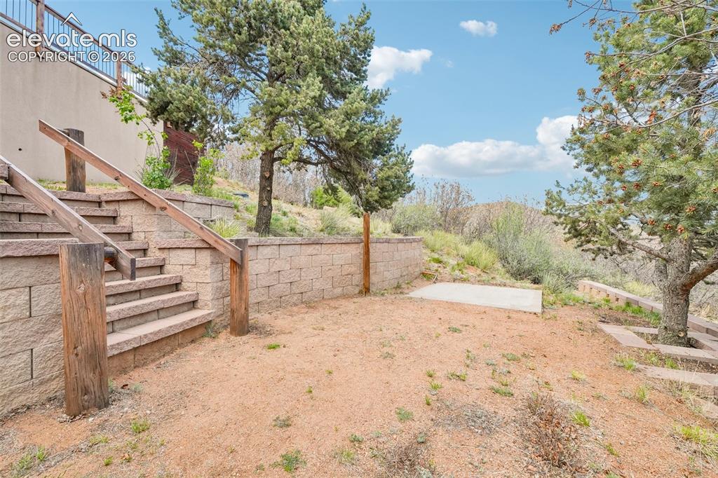 858 Oak Ridge Road Manitou Springs, CO 80829 - Photo 46 of 50 Backyard with read and wired for a hot tub!!!