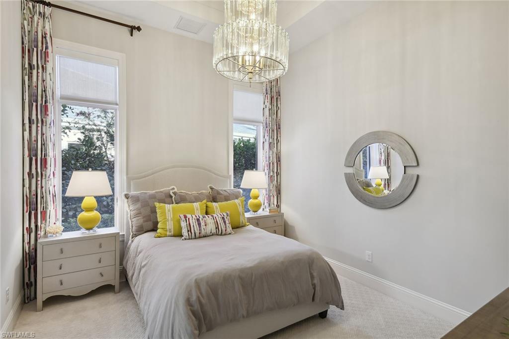 675 Anchor Rode Drive Naples, FL 34103 - Photo 15 of 19 a bedroom with a bed and a window