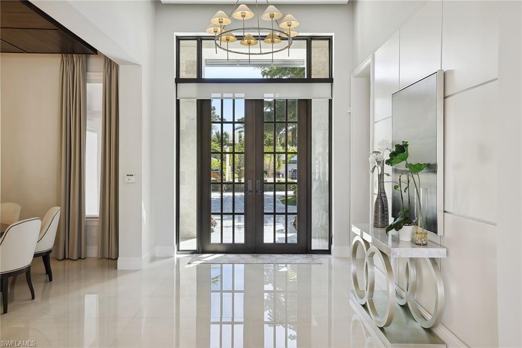 675 Anchor Rode Drive Naples, FL 34103 - Photo 4 of 19 a view of front door with furniture