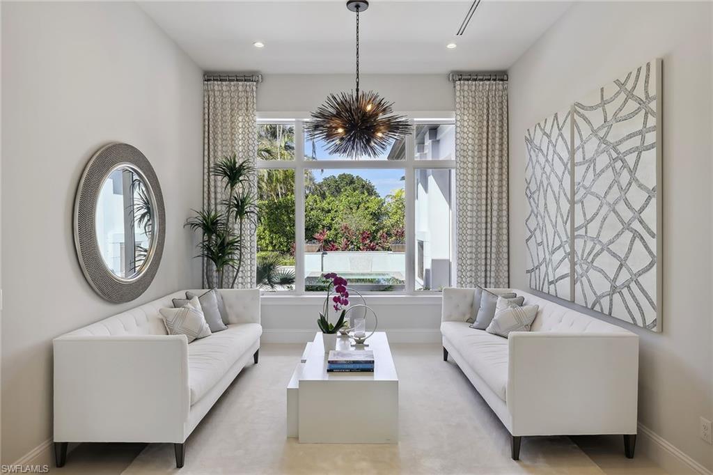 675 Anchor Rode Drive Naples, FL 34103 - Photo 6 of 19 a living room with furniture and a large window