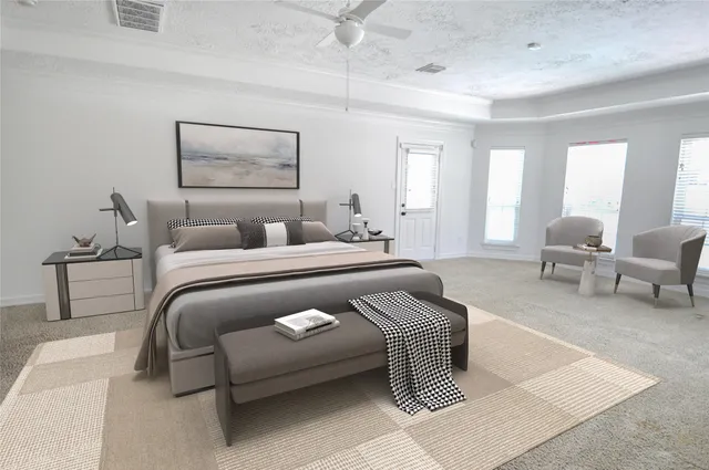 a bedroom with furniture and a lamp