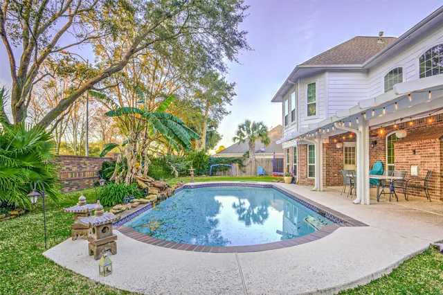 a view of outdoor space yard and swimming pool