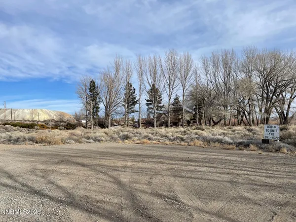 a view of a backyard of a house