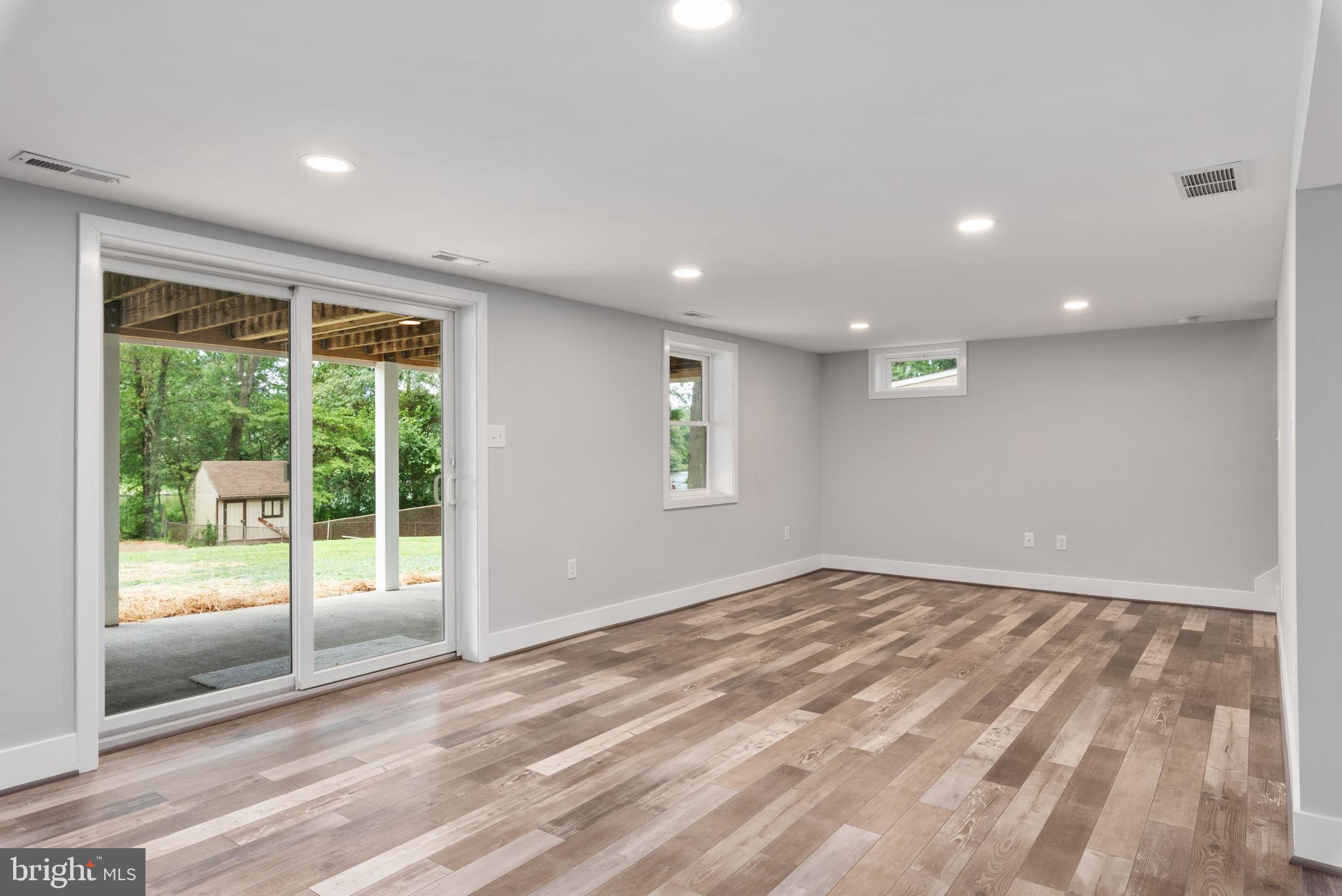 444 Royal Beach Road Pasadena, MD 21122 - Photo 32 of 52 Walk out Lower Level to Concrete Patio