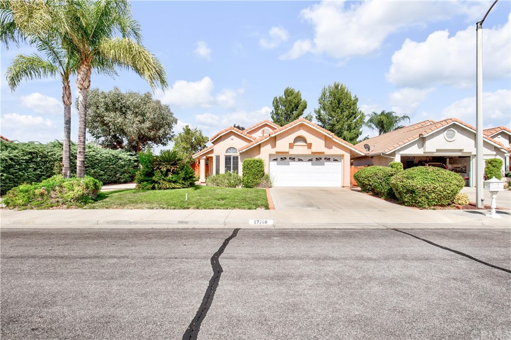 27288 Prominence Road Menifee, CA 92586 - Photo 1 of 1 a view of multiple houses with a yard and potted plants