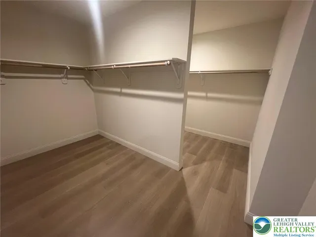 a view of an empty walk in closet